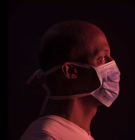 Black man wearing mask during COVID-19 pandemic